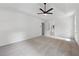 Large main bedroom with plush carpet, ceiling fan, and an en-suite bathroom at 2863 Landing Dr, Marietta, GA 30066