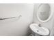 Bathroom featuring a white vanity with an oval mirror and chrome fixtures at 3134 Imperial Sw Cir, Atlanta, GA 30311