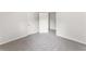 This bedroom has neutral carpeting and a doorway leading to another room at 3134 Imperial Sw Cir, Atlanta, GA 30311