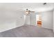 The bedroom has neutral carpet and provides access to an adjacent bathroom at 3134 Imperial Sw Cir, Atlanta, GA 30311