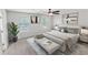 This staged bedroom offers natural light, a ceiling fan and tasteful decor at 3134 Imperial Sw Cir, Atlanta, GA 30311