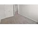 Bedroom with carpet, light grey walls, and white doors at 3134 Imperial Sw Cir, Atlanta, GA 30311
