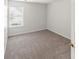 Bedroom with carpet, window, and neutral walls at 3134 Imperial Sw Cir, Atlanta, GA 30311