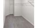 This walk-in closet features neutral carpeting and wire shelving at 3134 Imperial Sw Cir, Atlanta, GA 30311