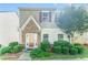 Charming two-story home with brick and shake siding, plus a well-manicured front yard with lush landscaping at 3134 Imperial Sw Cir, Atlanta, GA 30311