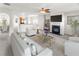 Inviting living room featuring a cozy fireplace, stylish furniture, and an open layout with neutral tones at 3134 Imperial Sw Cir, Atlanta, GA 30311