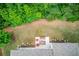 Aerial view of the backyard, showcasing the patio and landscaping at 4241 Summer Breeze Way, Buford, GA 30518