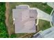 Aerial shot of the house, revealing its roof and surrounding greenery at 4241 Summer Breeze Way, Buford, GA 30518