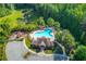 Aerial view of the community pool, clubhouse, and playground area at 4241 Summer Breeze Way, Buford, GA 30518