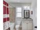 Cozy bathroom with granite countertop vanity, and shower-tub with curtain at 4241 Summer Breeze Way, Buford, GA 30518
