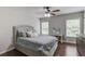 Bedroom with hardwood floors, vanity and a large window at 4241 Summer Breeze Way, Buford, GA 30518