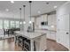 Modern kitchen with granite counters, stainless steel appliances, and a center island at 4241 Summer Breeze Way, Buford, GA 30518