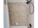 Tiled shower with adjustable shower head and soap dish at 4241 Summer Breeze Way, Buford, GA 30518
