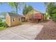 Backyard featuring a shed, parking area, and deck perfect for outdoor entertaining at 636 Cameron Street Se St, Atlanta, GA 30312