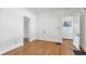 Bright bedroom featuring hardwood floors, neutral paint, and traditional trim at 636 Cameron Street Se St, Atlanta, GA 30312