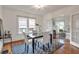 Dining area boasting natural light, hardwood floors, and easy access to the living room at 636 Cameron Street Se St, Atlanta, GA 30312