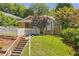 A cozy home with a well-maintained lawn and classic white picket fence at 636 Cameron Street Se St, Atlanta, GA 30312