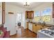 Functional kitchen showcasing classic finishes, a gas range, and a view into the living room at 636 Cameron Street Se St, Atlanta, GA 30312
