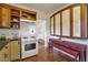 Charming kitchen with hardwood floors, updated appliances, and a vintage design at 636 Cameron Street Se St, Atlanta, GA 30312