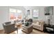Bright and airy living room filled with natural light, stylish furniture and artwork at 636 Cameron Street Se St, Atlanta, GA 30312