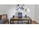 Home office featuring desk with glass top, comfortable chair, and minimalist decor at 636 Cameron Street Se St, Atlanta, GA 30312