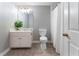 Cozy bathroom with granite countertops, white cabinets, and a full shower at 10135 High Falls Pointe, Johns Creek, GA 30022