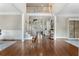 Elegant foyer with soaring ceilings, hardwood floors, and a staircase leading to the second level at 10135 High Falls Pointe, Johns Creek, GA 30022
