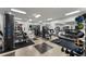 Community fitness center equipped with a variety of weight machines and free weights at 10135 High Falls Pointe, Johns Creek, GA 30022