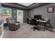 Finished office with neutral colors, natural light, and ample desk space with a comfortable chair at 10135 High Falls Pointe, Johns Creek, GA 30022