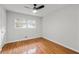 Bright bedroom with hardwood floors and natural light from the window at 2786 Georgian Ter, Marietta, GA 30068