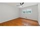 Bright bedroom with hardwood floors, ceiling fan, and natural light from the window at 2786 Georgian Ter, Marietta, GA 30068