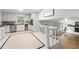 Bright and airy kitchen with white cabinets, modern appliances, and an open layout leading to the living room at 2786 Georgian Ter, Marietta, GA 30068