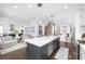 Spacious kitchen featuring a large island, stainless steel appliances, and an open layout at 410 Concord St, Alpharetta, GA 30009