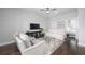 Cozy living room with hardwood floors, TV, comfortable seating and ample natural light at 410 Concord St, Alpharetta, GA 30009