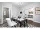 Stylish office with a sleek desk, white chair, and views of the bathroom and stairway at 410 Concord St, Alpharetta, GA 30009