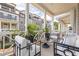 Inviting outdoor covered porch with comfortable seating, perfect for relaxing and enjoying the neighborhood views at 410 Concord St, Alpharetta, GA 30009