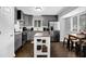 Modern kitchen featuring stainless steel appliances, granite countertops, and center island at 5461 Forest Path Ct, Stone Mountain, GA 30088