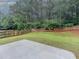 Well-maintained backyard with a patio and a wooden fence, offering privacy at 750 Summerstone Ln, Lawrenceville, GA 30044