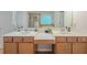 Large main bathroom featuring double sinks, vanity and separate areas for bath and shower at 750 Summerstone Ln, Lawrenceville, GA 30044