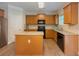 Spacious kitchen featuring hardwood floors, an island, and stainless steel appliances at 750 Summerstone Ln, Lawrenceville, GA 30044