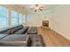 Spacious living room with a fireplace, ceiling fan and large windows offering plenty of natural light at 750 Summerstone Ln, Lawrenceville, GA 30044