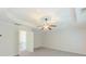 Bright main bedroom features a ceiling fan, neutral paint, and ensuite bathroom at 750 Summerstone Ln, Lawrenceville, GA 30044
