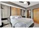 Luxurious main bedroom features modern lighting and elegant design, creating a serene and stylish space for relaxation at 898 Oak Sw St # 3204, Atlanta, GA 30310