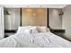 Serene main bedroom with stylish headboard, ambient lighting, and tasteful decor, offering a peaceful retreat at 898 Oak Sw St # 3204, Atlanta, GA 30310