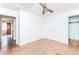Bedroom featuring hardwood floors, a ceiling fan, and doorways to adjoining rooms at 1913 Flintwood Se Dr, Atlanta, GA 30316