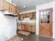 Retro kitchen with vintage cabinets and a unique back door, presenting a great opportunity for a modern renovation at 1913 Flintwood Se Dr, Atlanta, GA 30316