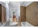 Bathroom features tile shower and tile floors at 2021 Sherwood Dr Se, Marietta, GA 30062