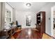 Bright, open-concept dining area showcasing beautiful hardwood floors, recessed lighting, and neutral decor at 2021 Sherwood Dr Se, Marietta, GA 30062