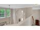 View of a multi-story foyer with large windows providing great light, and neutral-toned walls at 3522 Estates Landing Nw Dr, Kennesaw, GA 30144