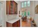 Open floor plan with butler's pantry, seamlessly connecting the kitchen, dining, and living areas at 3522 Estates Landing Nw Dr, Kennesaw, GA 30144